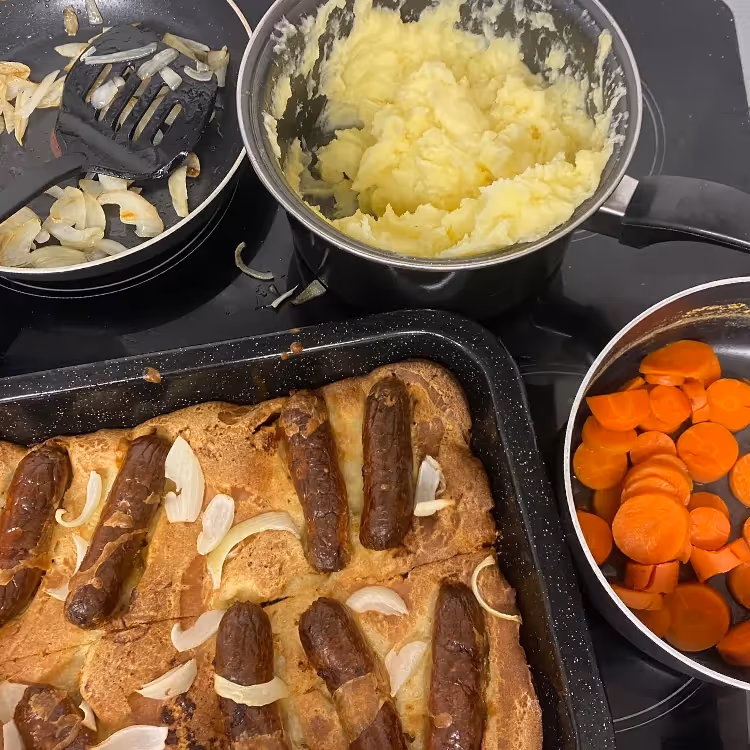 Just out the oven - toad in the hole with mash potato and carrots