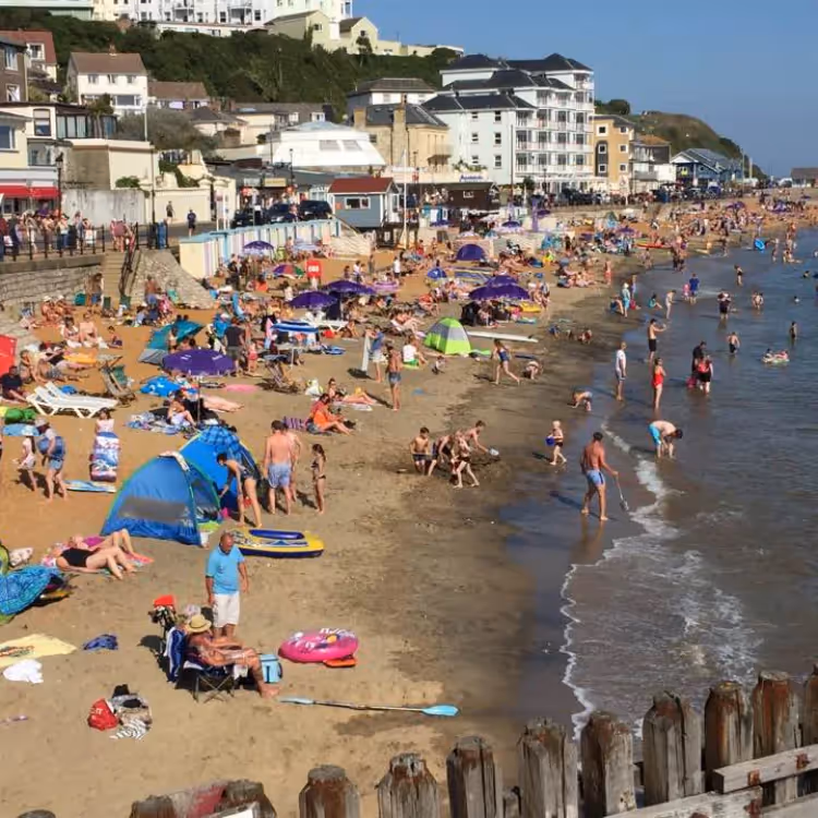 A busy beach on a summers day