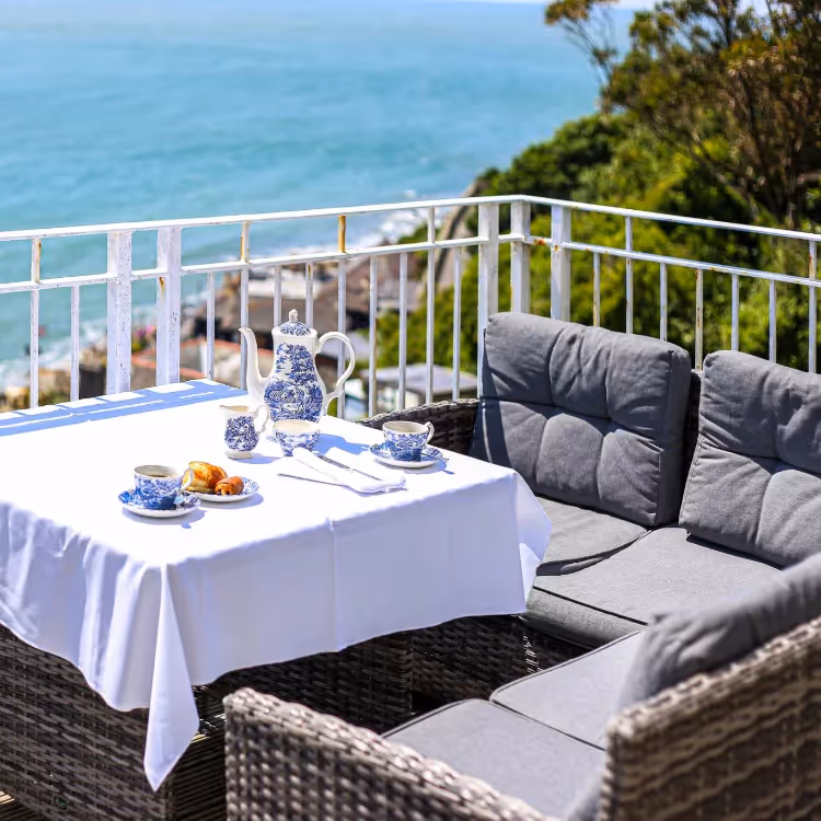 Breakfast served on the terraced deck of a hotel