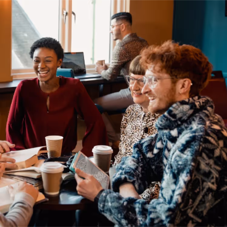 A group of people at a book club meting