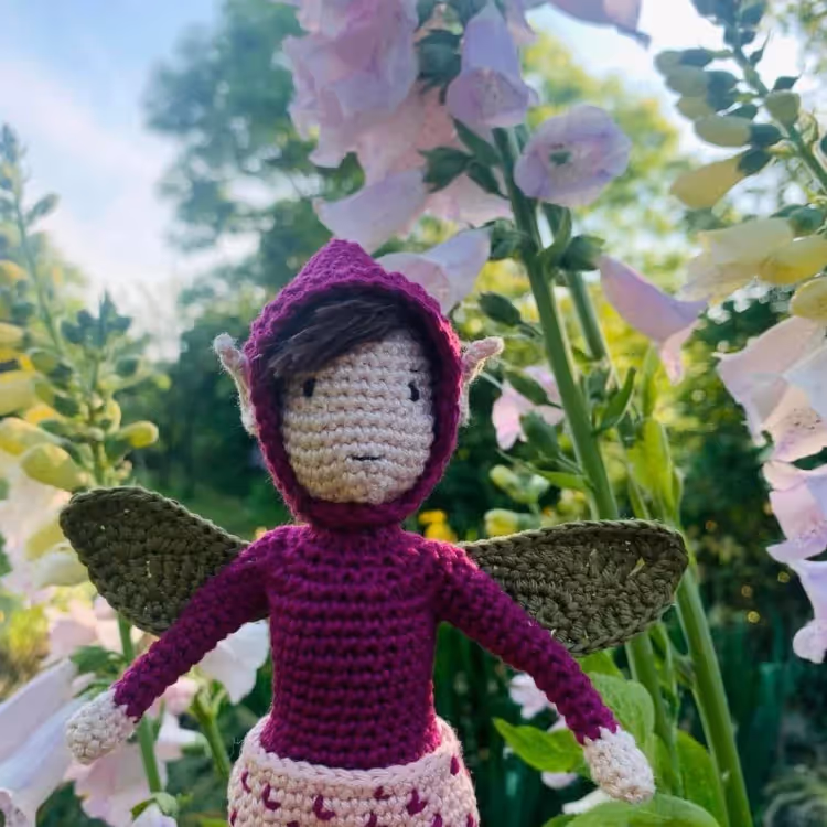 A crocheted flower fairy