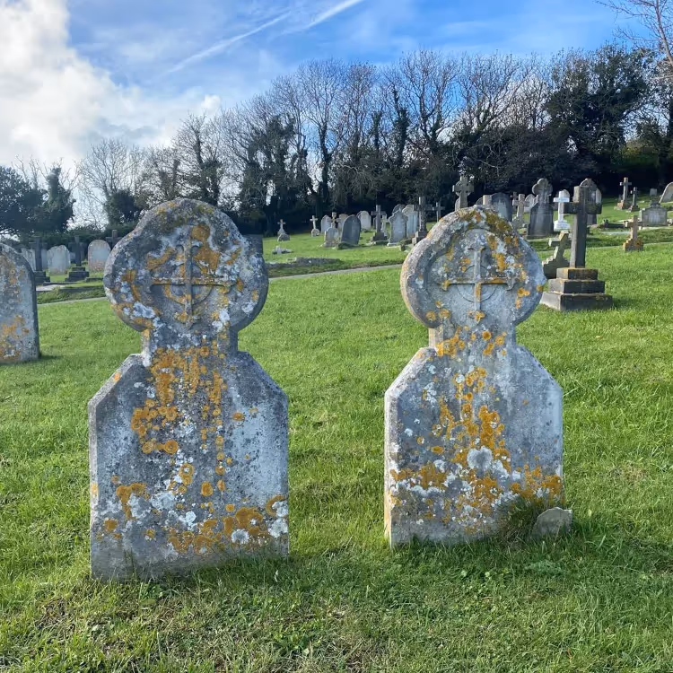 Two grave stones in a graveyard
