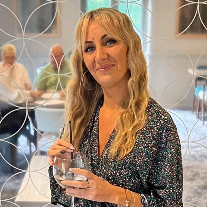 A hairdresser in her salon