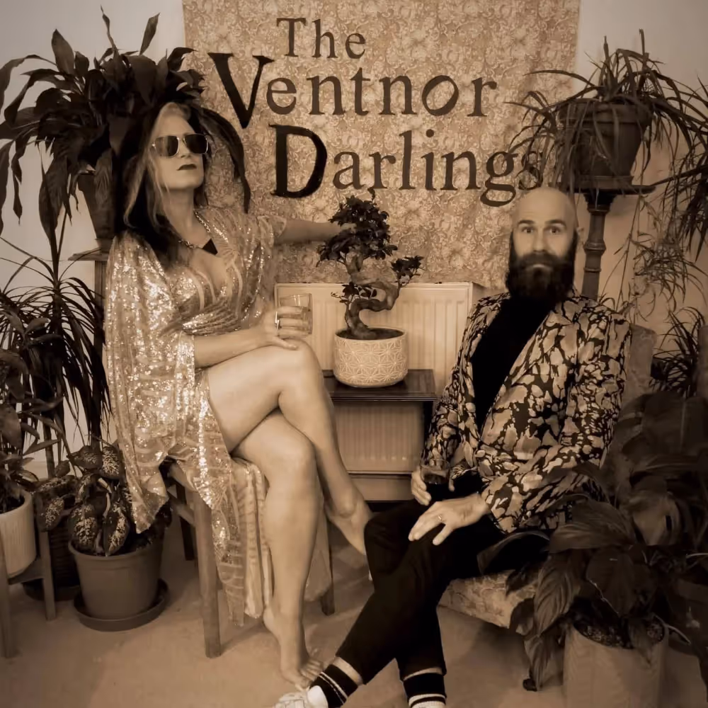 A sepia coloured advert for a musician duo