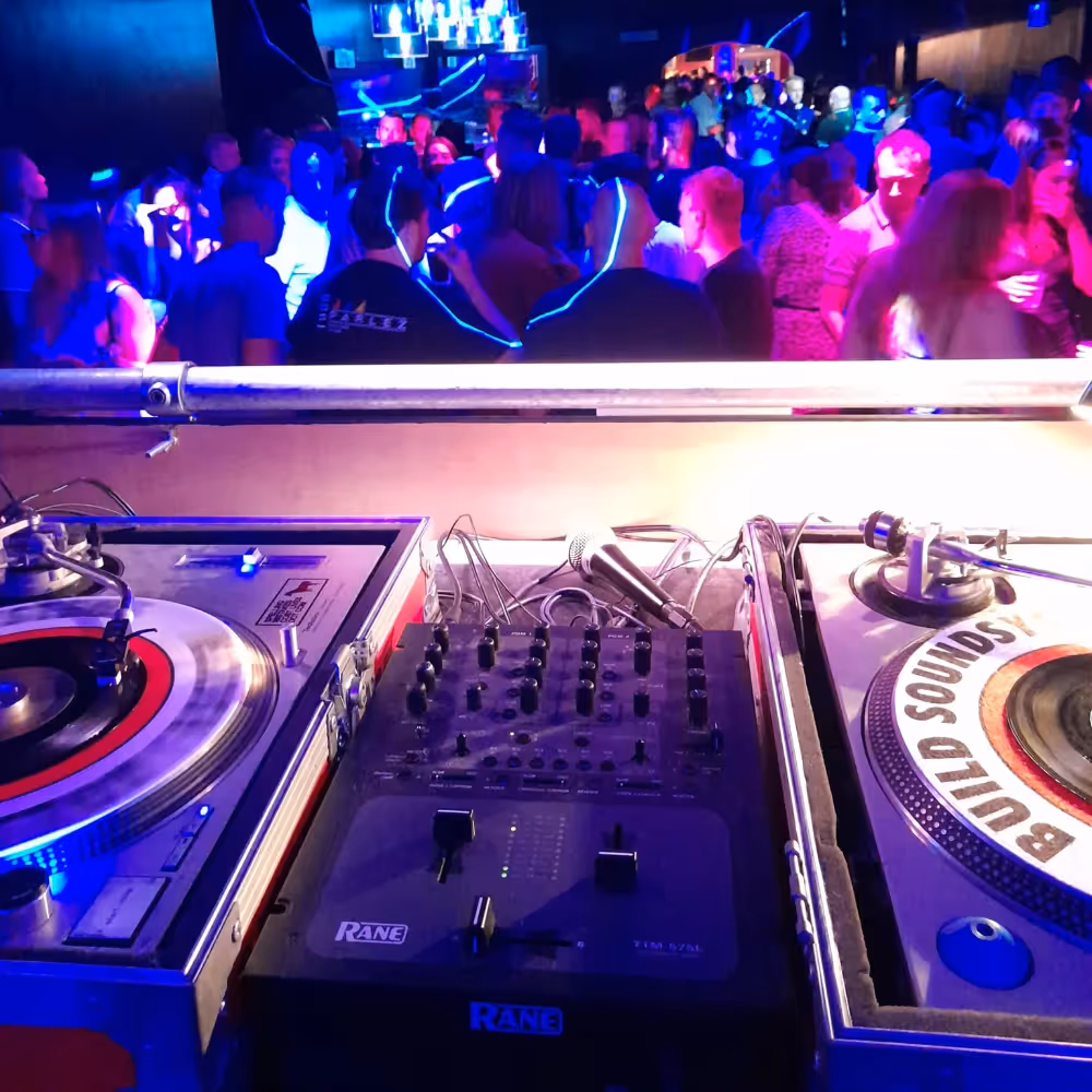 View from a DJ's desk of dancers
