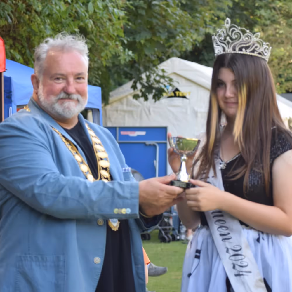 A town mayor crowning the carnival princess