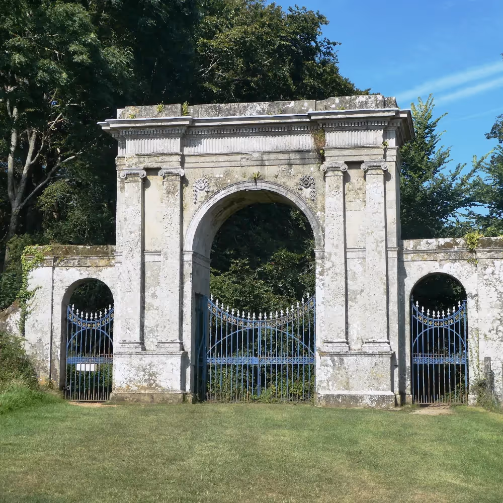 An old entrance arch to a country house driveway