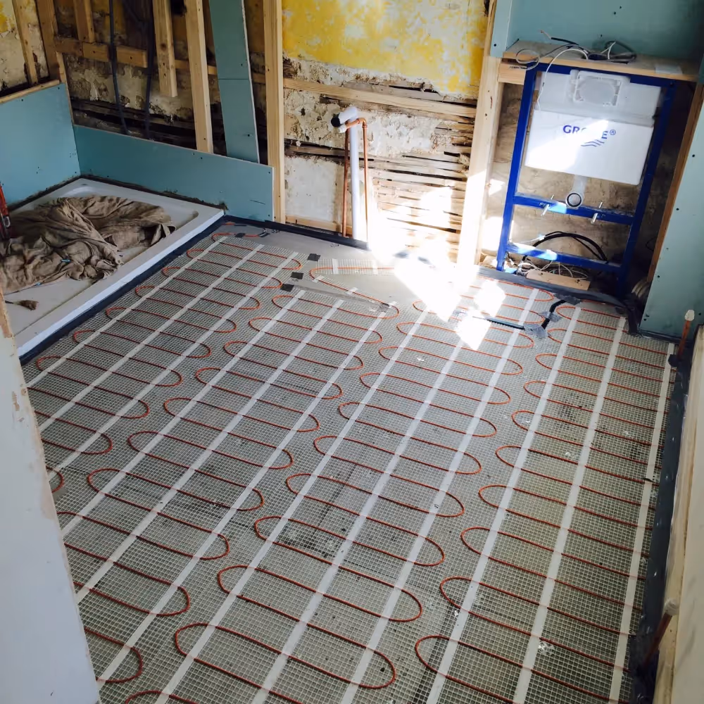 Underfloor heating being installed in a room