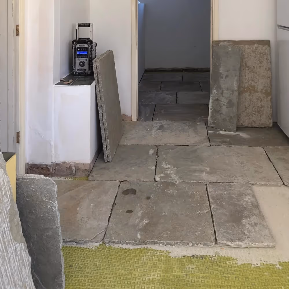Stone flooring being installed
