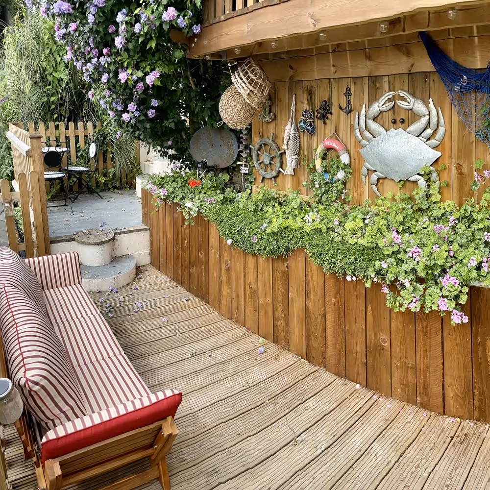 Outdoor seating area with rustic wood and a nautical feel