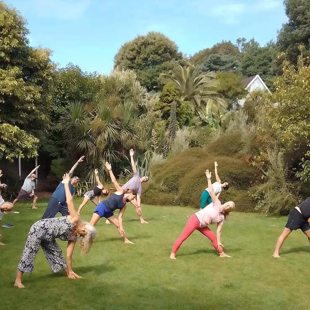 Yoga students in an outdoor setting