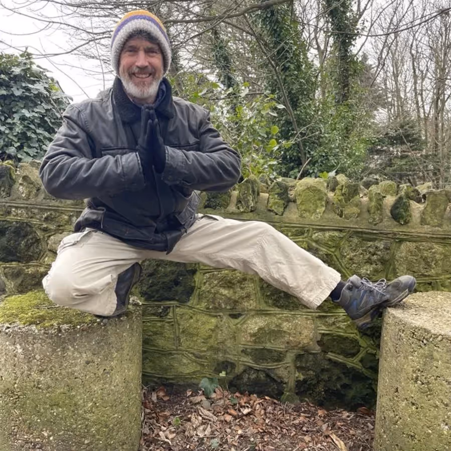 A man performing a yoga pose