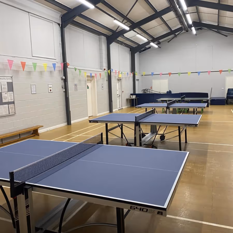 Table tennis tables set up ready for the teams to arrive