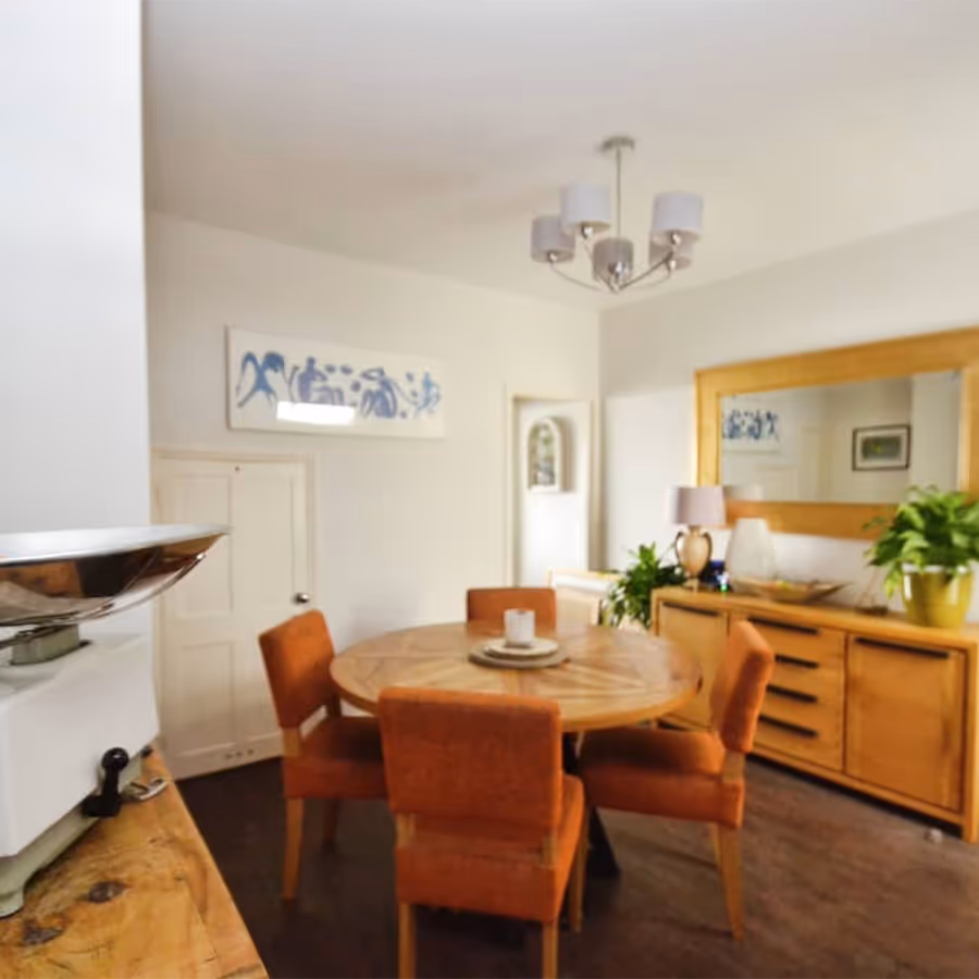 A dining room with mid century furniture
