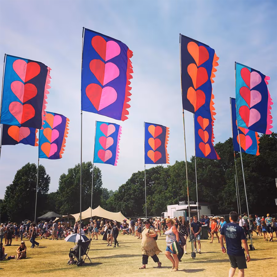 A series of large colourful festival flags