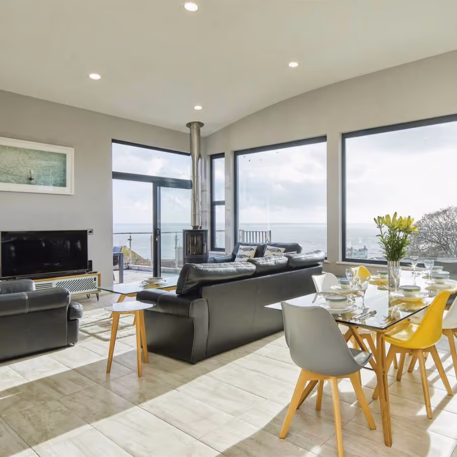 A modern masculine living room with sea views