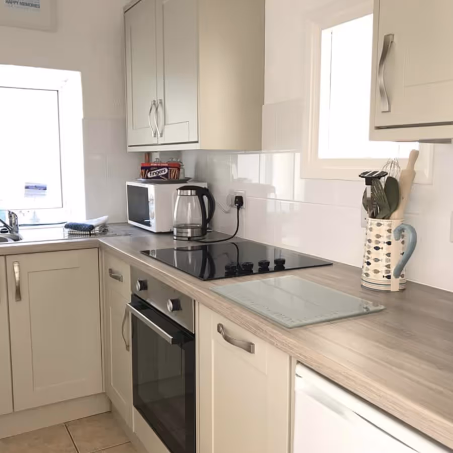 A cream shaker kitchen