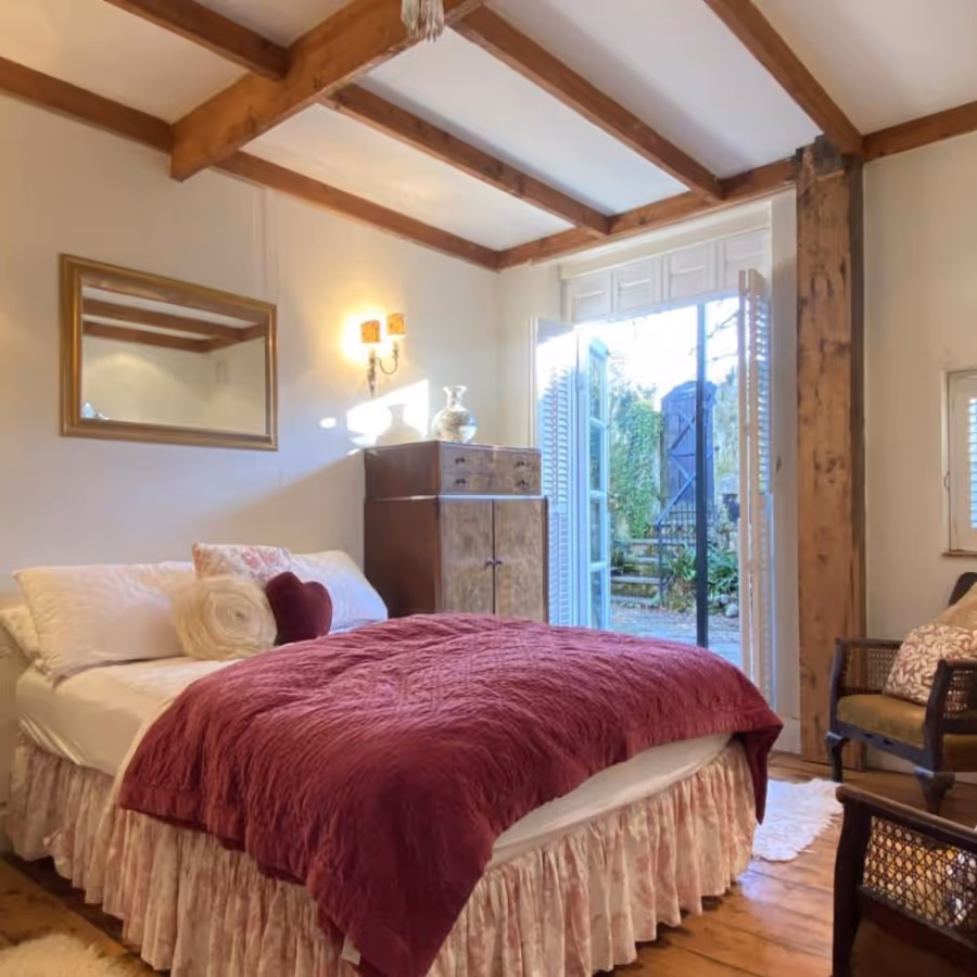 A country bedroom with traditional furnishings