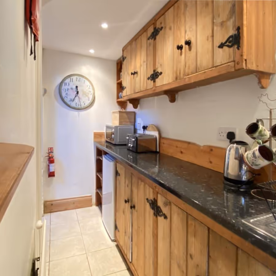 A country pine galley kitchen