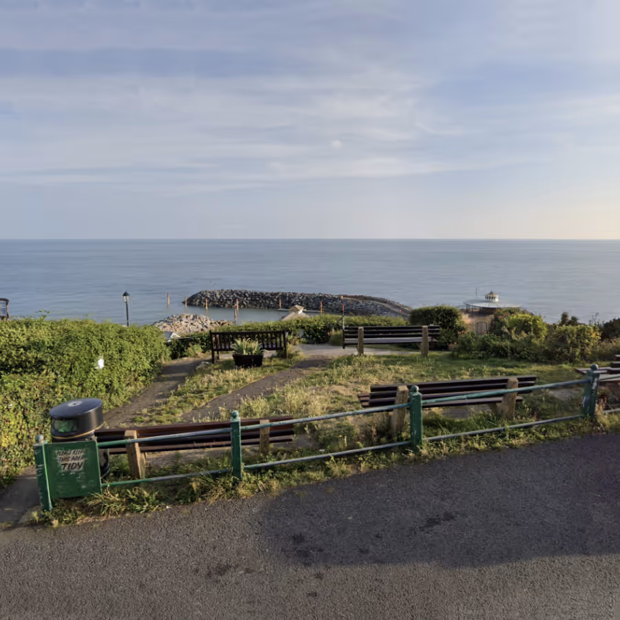 A small public park overlooking the sea