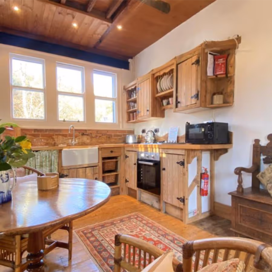 A wooden kitchen in a converted stable block