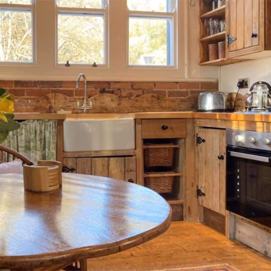 A wooden kitchen in a converted stable block