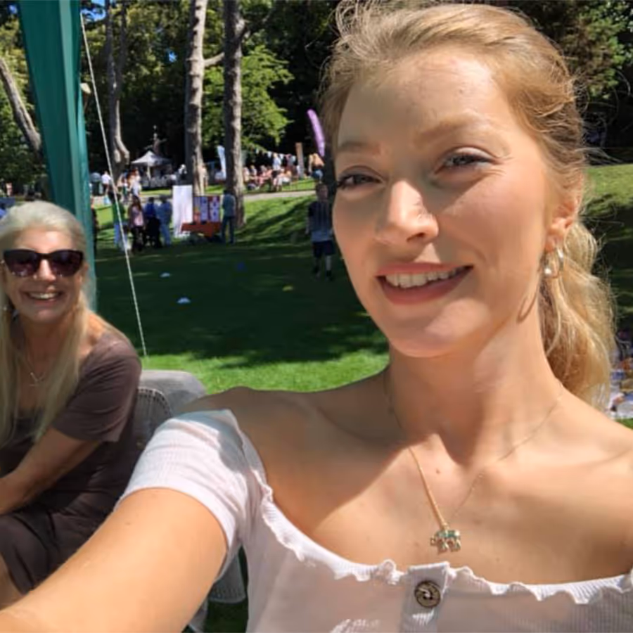 A lady in a white summer dress