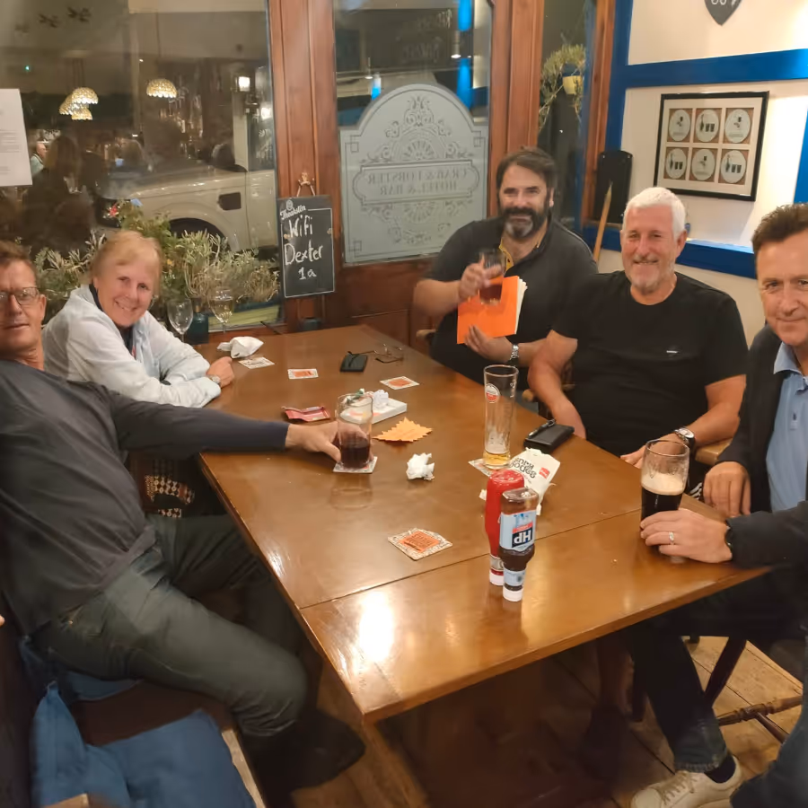 People in a pub enjoying a charity quiz night