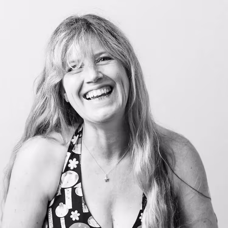A black and white photo of a woman with long blonde hair