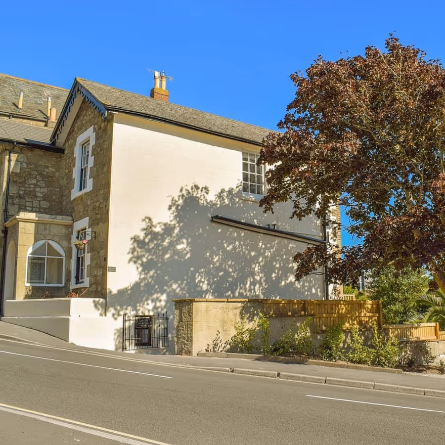 An old Victorian house on a hill