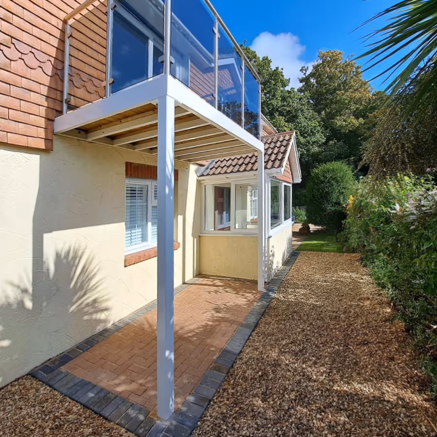 A glass balcony on a house