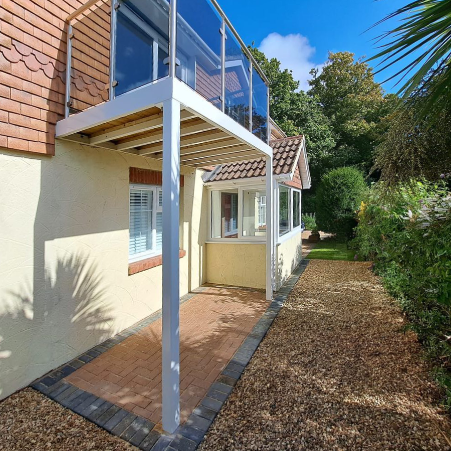 A glass balcony on a house