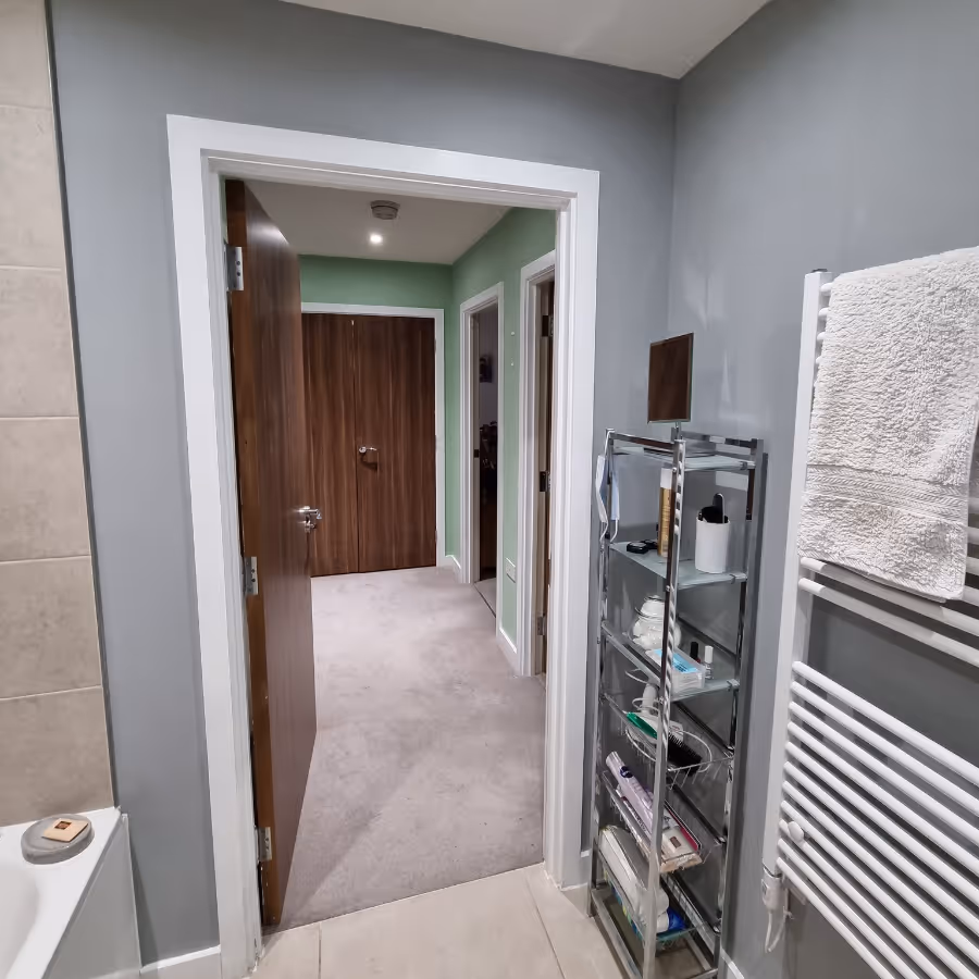 A bathroom with grey walls