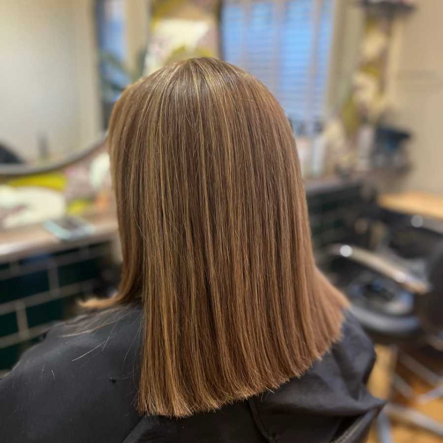 The back of a lady's head at a hairdressers