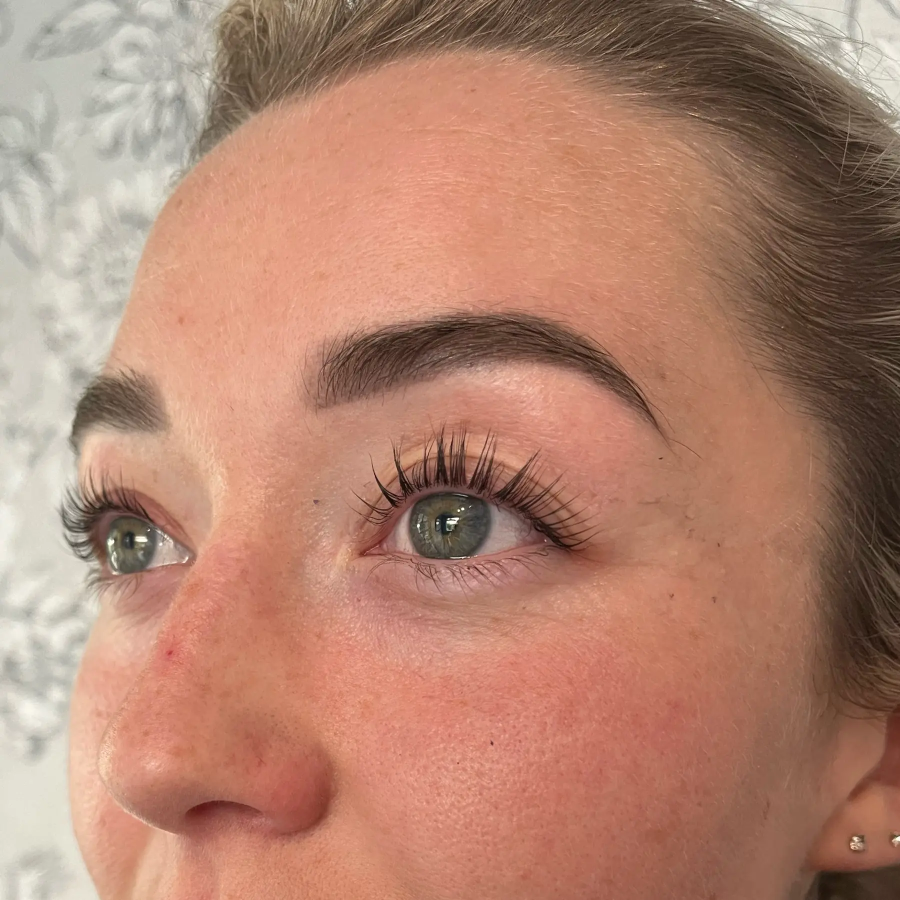 A lady with freshly tinted eyelashes an laminated eyebrows
