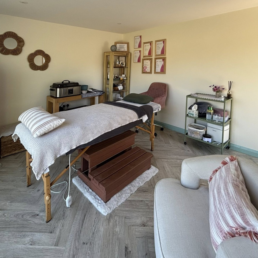 A massage couch in a treatment room