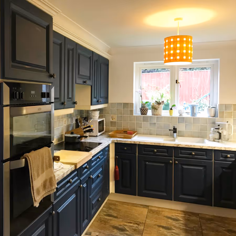 A black painted kitchen