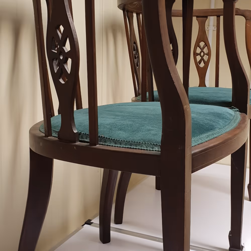 A pair of antique side chairs.