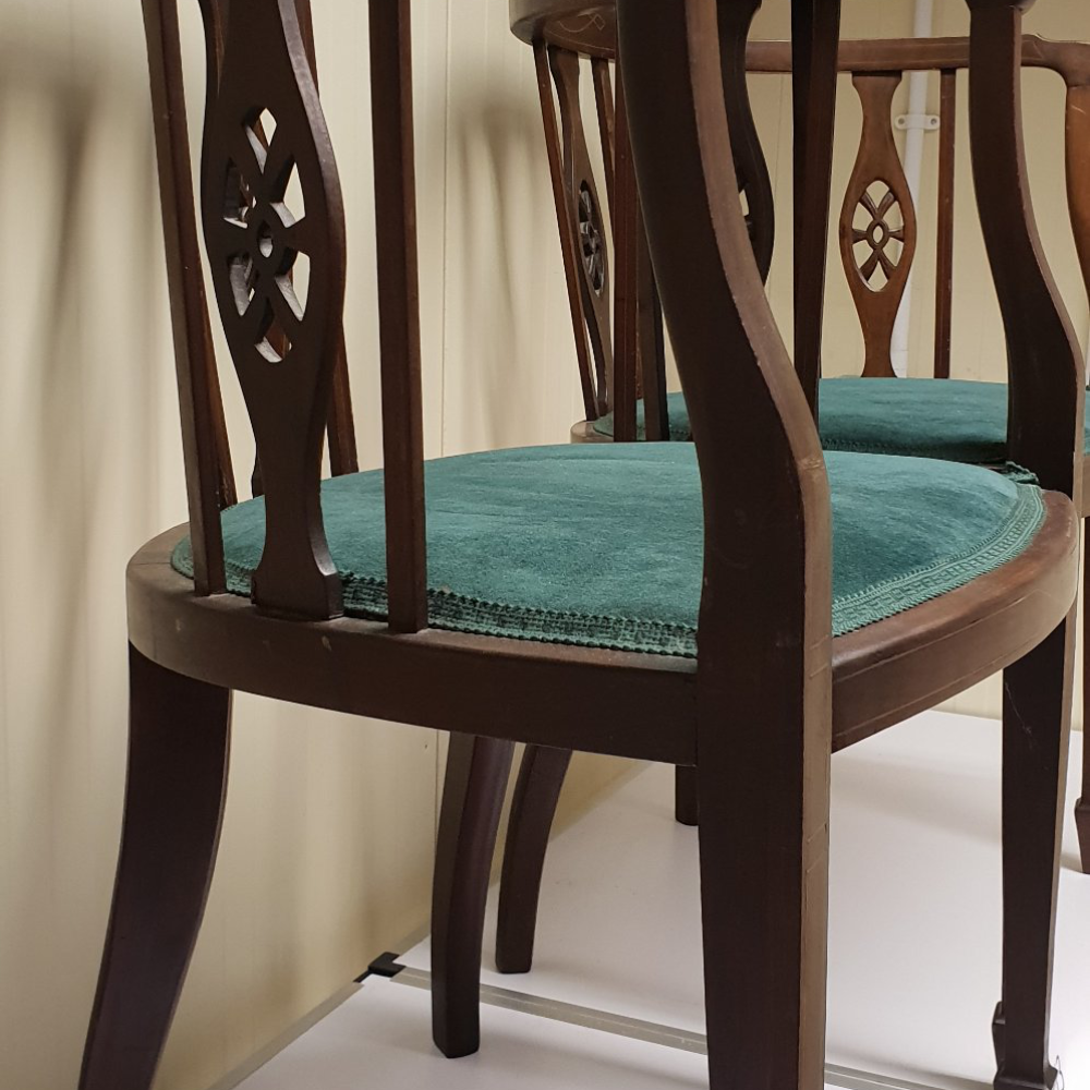 A pair of antique side chairs.