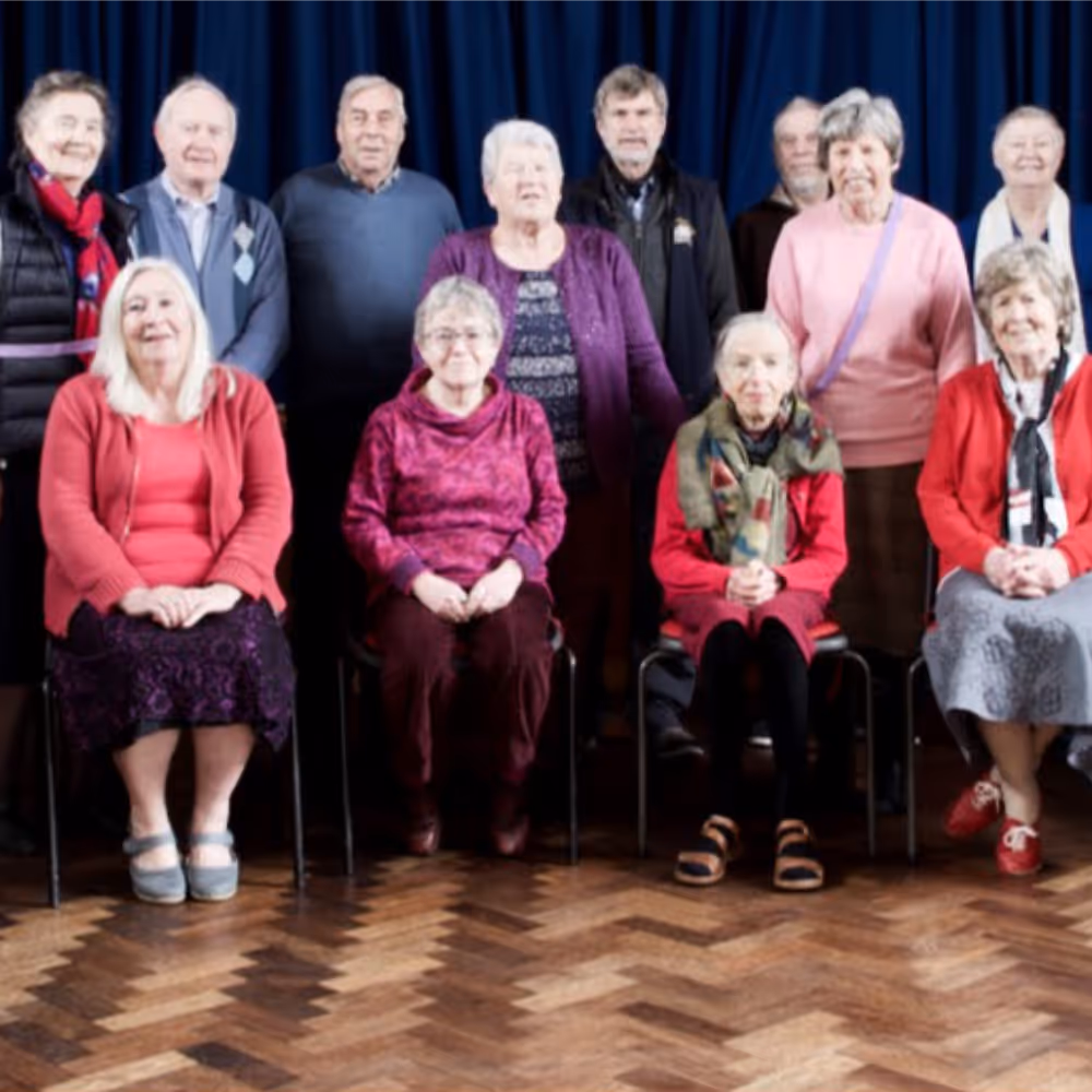A group of people posing for a photograph.