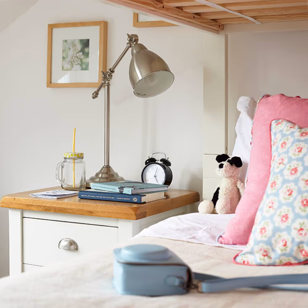 A kids bedroom with a country feel.