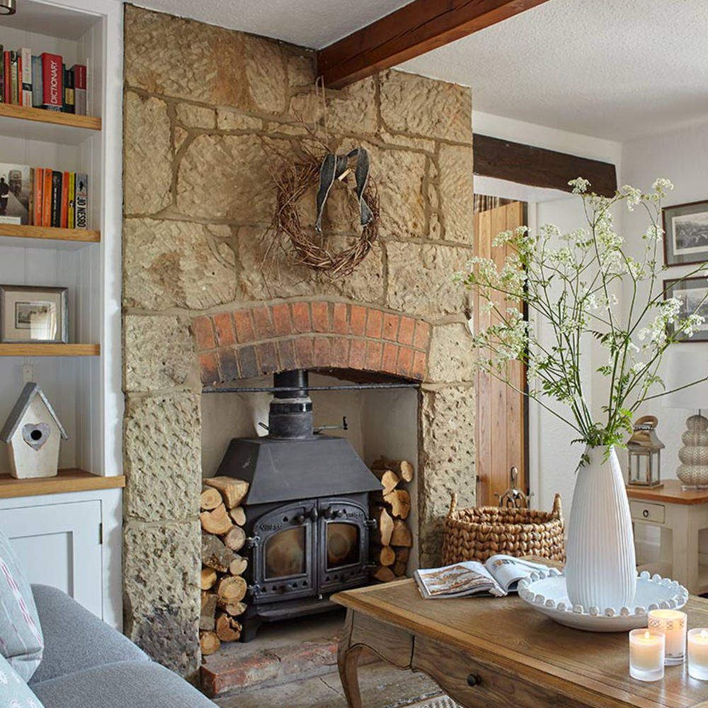 A country house stone fireplace.