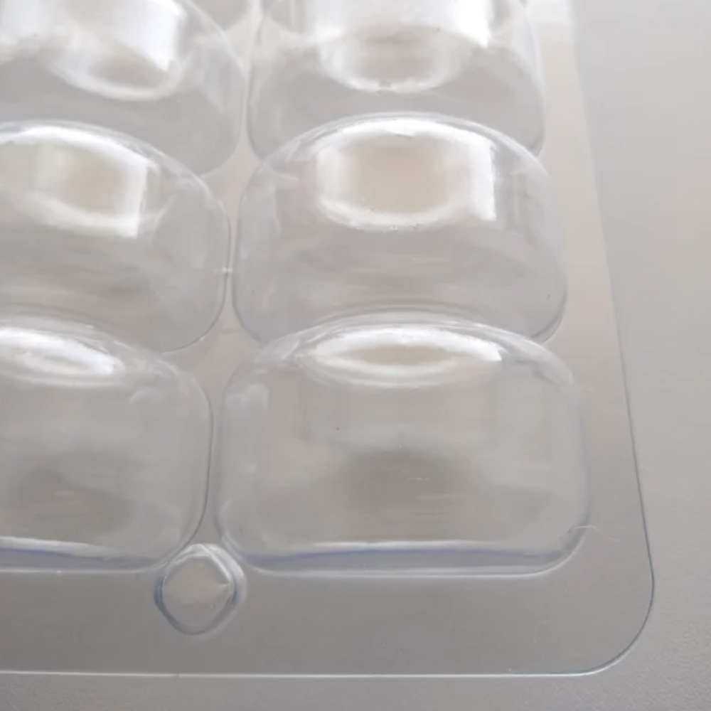 A plastic storage tray for French macarons