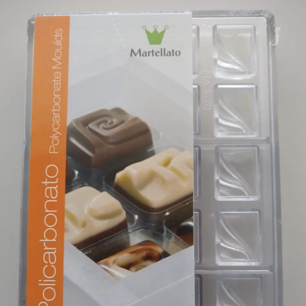 A plastic storage tray for prauline chocolates