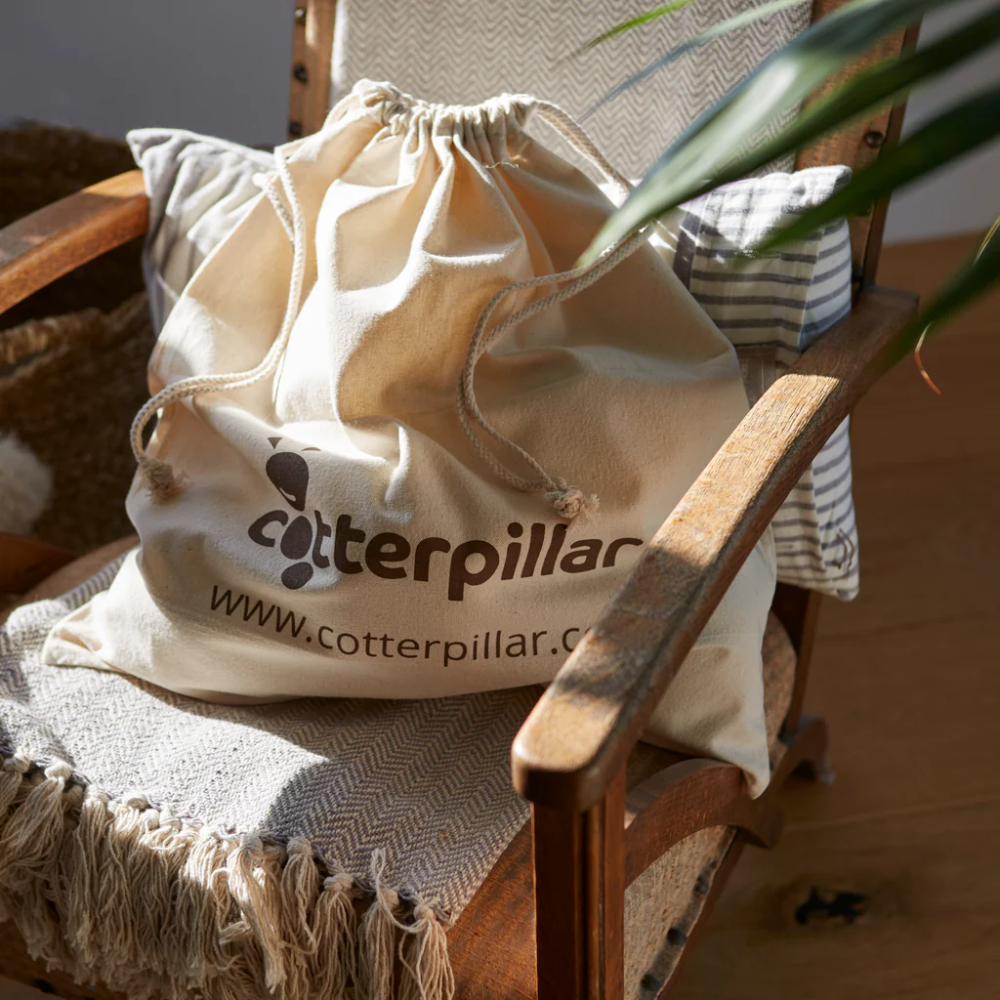 A canvas gift bag for a product by a company called Cotterpillar