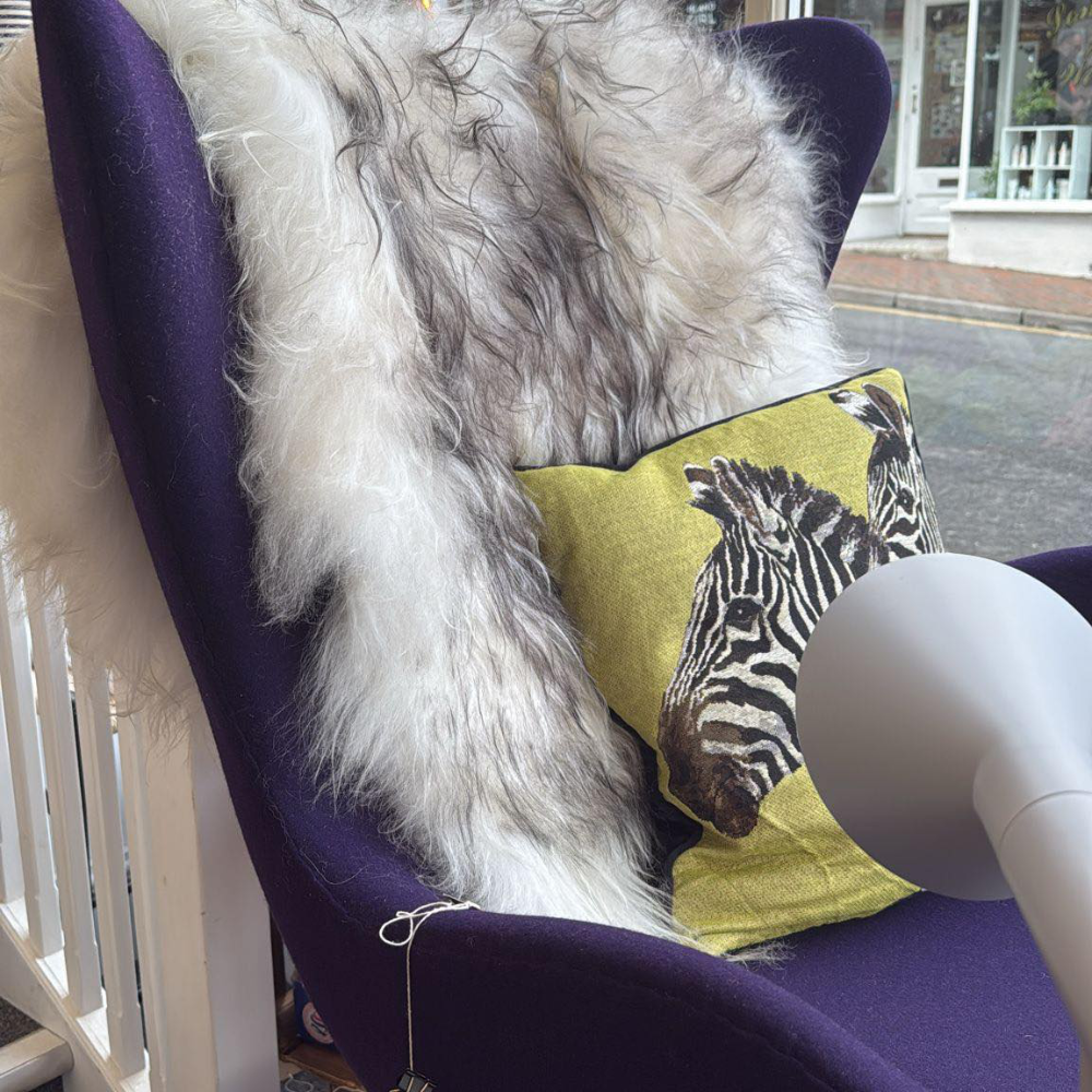 A sheepskin draped over an armchair