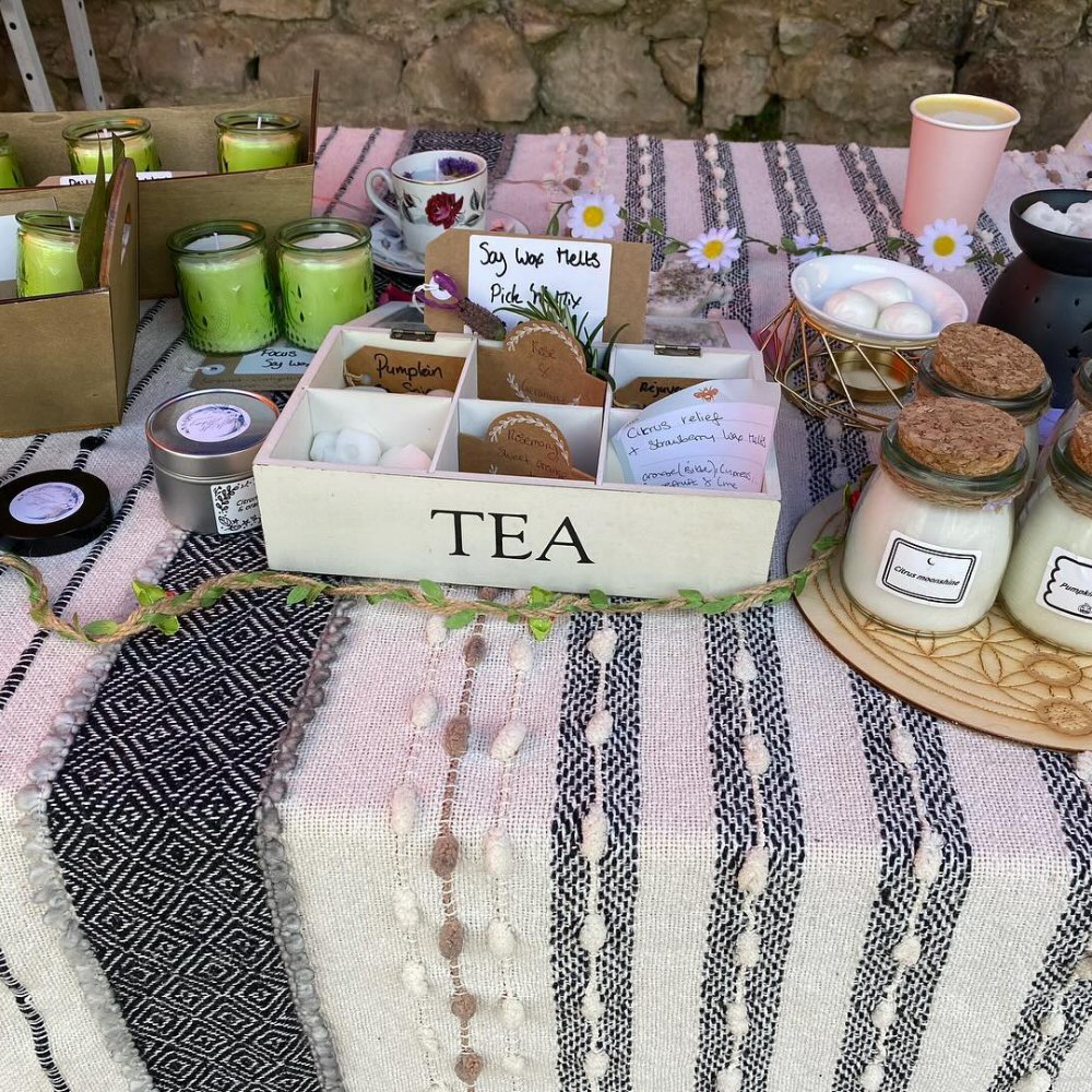 Aromatherapy products for sale in a craft market.
