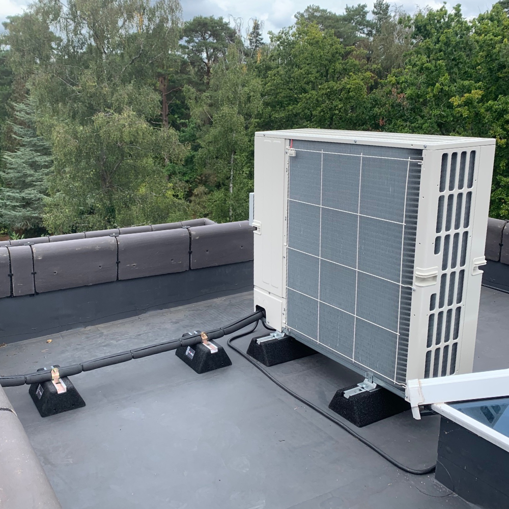 An air condiitoning unit on a rooftop