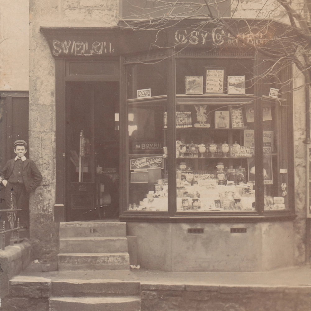 A sepia photo of a Victorian shop front