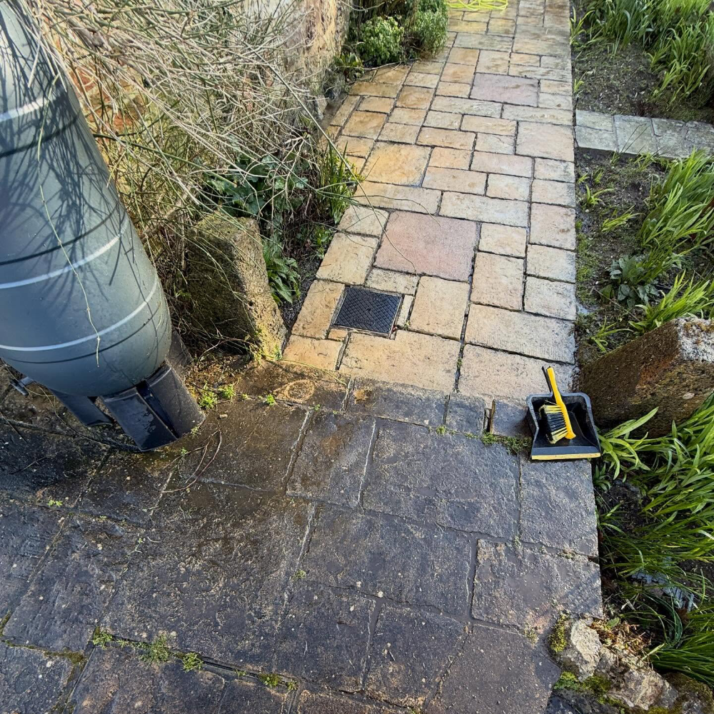 Before and after jet washing of a patio